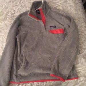 Women’s Patagonia fleece.   Grey w/ pink trim.